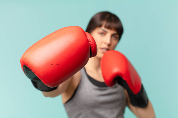 fitness woman with red boxing gloves. - Фото, изображение