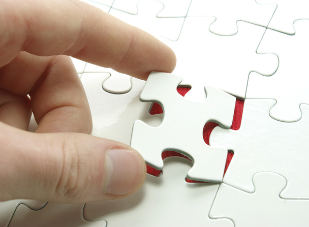 Hands holding a puzzle piece . business concepts - Foto, Imagen