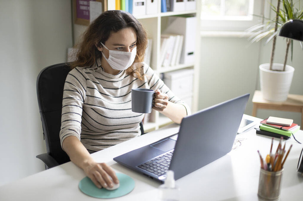 Young woman working from home after coronavirus pandemic - Foto, Imagem