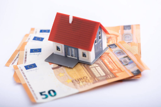 Model house on euro banknotes background cloe up - Фото, изображение