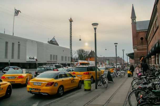 Copenhagen, Denmark; 02 15 2016. Taxis on Bernstorffsgade Street. Photograph taken on a cold and cloudy winter morning. - Foto, Imagen