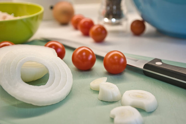 A closeup shot of ingredients for salad on a cutting board - Zdjęcie, obraz