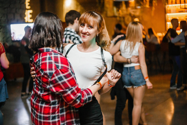 Kharkiv, Ukraine 08.04.21 Man and woman are dancing passionately kizomba at party - Foto, immagini