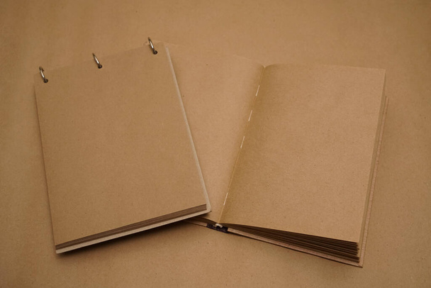 brown notepads. top view. empty blank. craft paper packground. - Photo, Image