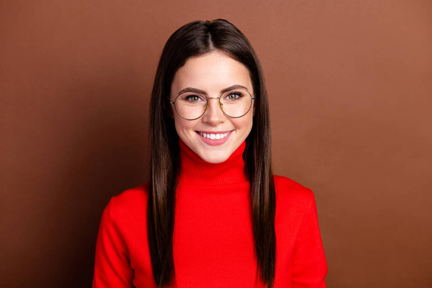 Photo of pretty cheerful girl beaming smile look camera wear spectacles isolated on brown color background - Fotó, kép