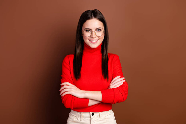 Photo of nice optiimstic brunette hairdo lady crossed arms wear spectacles red sweater isolated on brown background - Фото, зображення