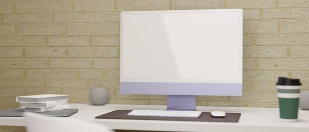Eenvoudige computer bureau met monitor, toetsenbord, accessoires en benodigdheden op witte tafel met bakstenen muur, 3D rendering, 3D illustratie - Foto, afbeelding