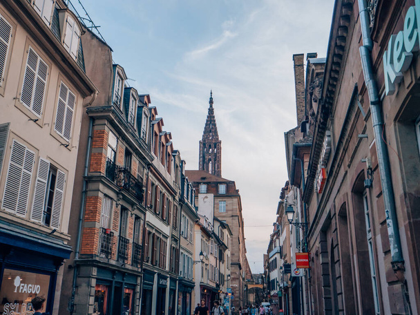 STRABOURG, FRANCE - Jul 30, 2019: Streets of Strasbourg on a sunny afternoonvEiffel Tower in Paris, France on a cloudy day  - Foto, Imagem