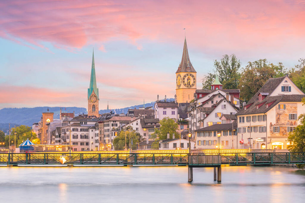Beautiful view of historic city center of Zurich at sunset in Switzerland - Photo, Image
