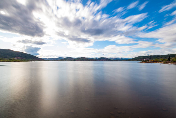 Long exposure view over the Lac du Salagou in cloudy weather (Occitanie, France) - Photo, Image
