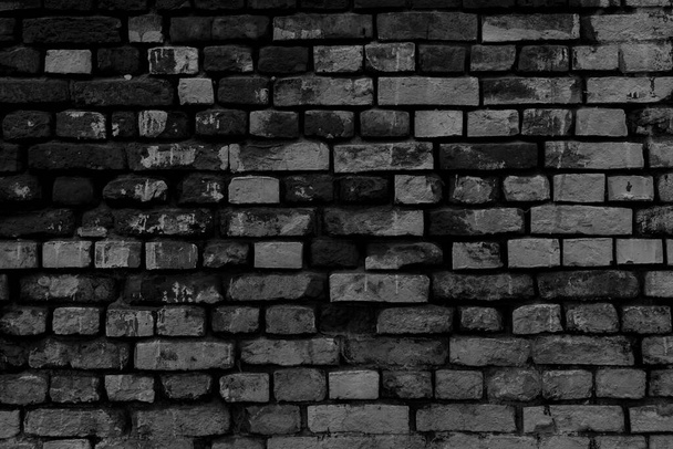 Black brick building wall. Interior of a modern loft. Background for design - Photo, Image