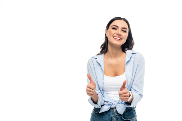 excited woman in blue shirt showing thumbs up isolated on white - Fotografie, Obrázek