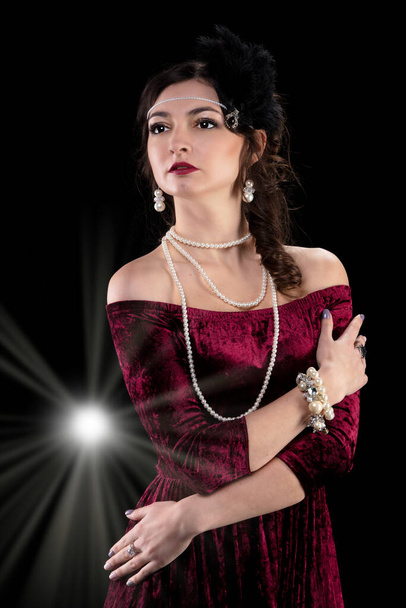 Retro woman portrait. Luxurious lady in vintage style from 20s or 30s. Photo of a girl in vintage style. - Photo, Image