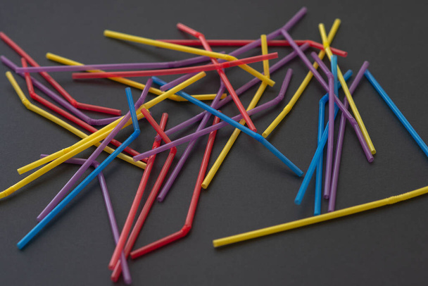 close up of drinking straw on black background - Foto, immagini