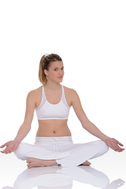 Fitness - Young woman in yoga position on white - Fotó, kép