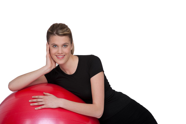 Fitness - Young happy woman with exercise ball on white background - Foto, Imagen