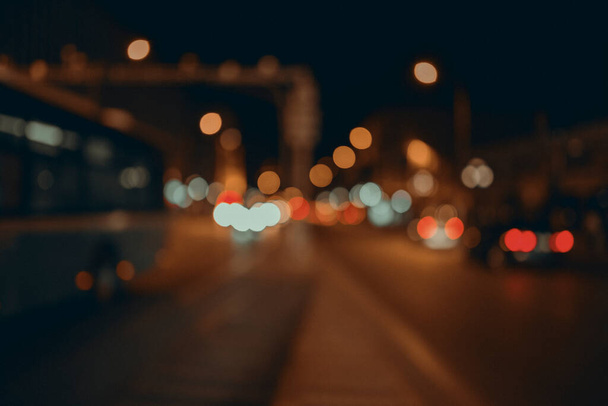 Night city street lights background and street lights blur bokeh  - 写真・画像