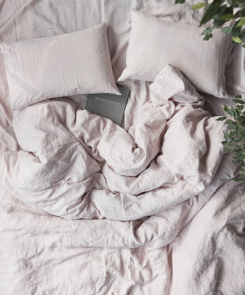 photo of beautiful ecological and natural linen bedding pastel colour with sheet, two pillows and large duvet cover - Foto, afbeelding