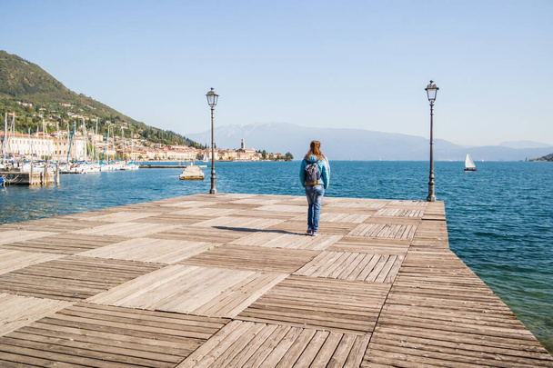 View of Lake Garda with tourist woman, from Sal, Brescia - Italy - Fotó, kép