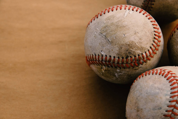 Old grunge baseballs on texture background for sport - Photo, Image