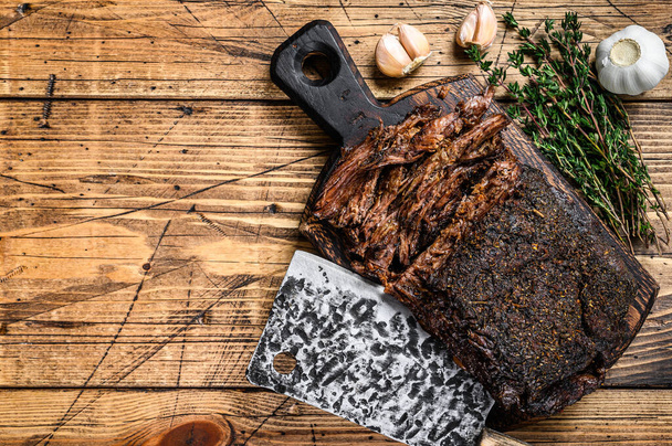 Homemade Smoked Barbecue Beef Brisket meat. wooden background. Top view. Copy space - Foto, Imagem