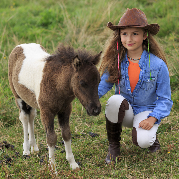 Ranch - Lovely girl with pony on the ranch - Photo, Image