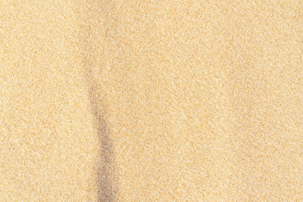 Fundo de textura de areia na praia. Luz bege mar areia textura padrão, fundo de praia arenosa. - Foto, Imagem