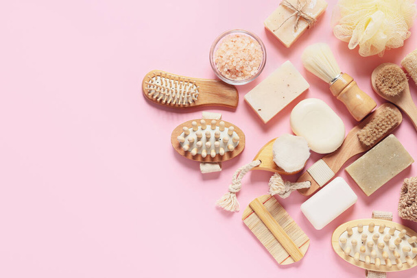 Composition with massage brushes and bath supplies on color background - Photo, image
