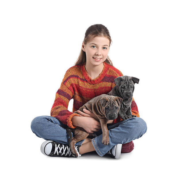 Cute girl with puppies on white background - Foto, Imagem