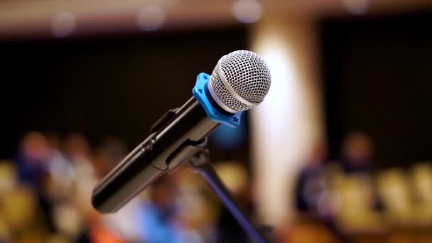 Close up of microphone in concert hall or conference room - Footage, Video
