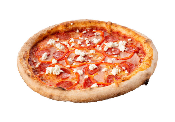 Pizza isolated on a white background. Pizza 4 seasons . Made on tomatoes, with spicy salami, tender ham, and complements with shades of sweet pepper and three cheeses. - Фото, изображение