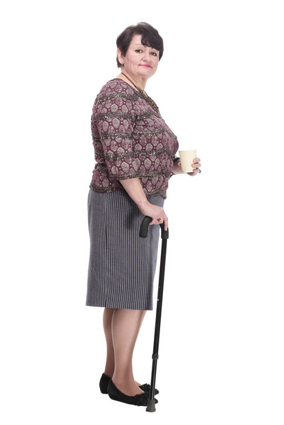 full-length. casual elderly woman with takeaway coffee. - Valokuva, kuva