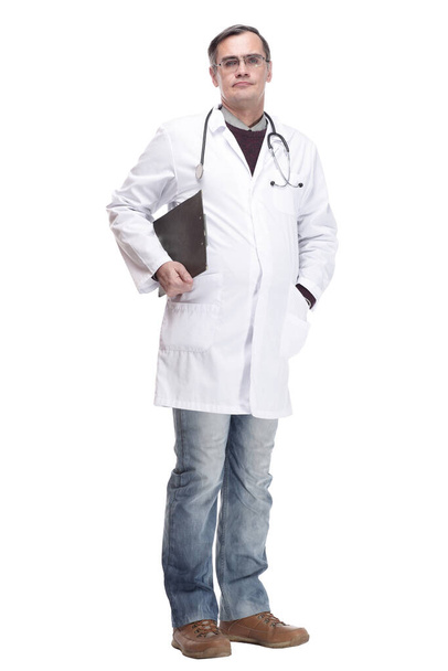 full-length. qualified doctor with clipboard. isolated on a white - Фото, зображення
