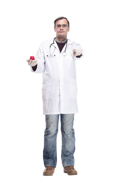 serious doctor with a laboratory flask in his hands . - Φωτογραφία, εικόνα