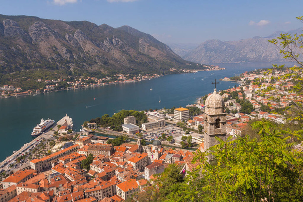 Wonderful view of the bell tower of the Church of Our Lady of Remedy standing on a hill in the town of Kotor. Montenegro  - Photo, Image