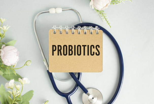 notepad with text PROBIOTICS medicine concept, DISPOSED TABLETS - Фото, изображение