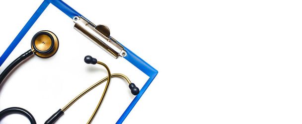 stethoscope and clipboard on white background - Photo, Image
