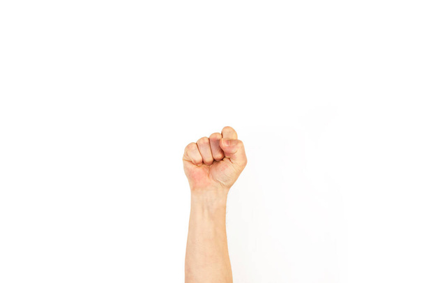 Мужская рука с сжатым кулаком на белом фоне - Фото, изображение