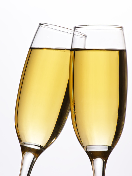 Two Champagne flutes, isolated on white. Clipping Path. - 写真・画像