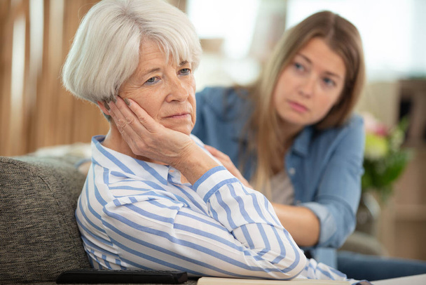 annoyed daughter arguing with stubborn old senior mother - Φωτογραφία, εικόνα