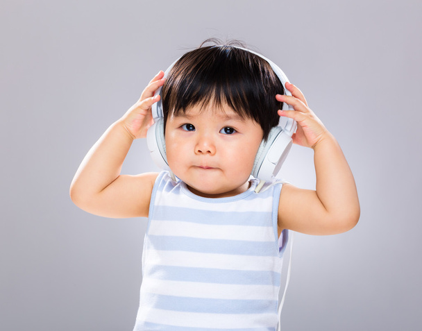 Baby with headphone - Photo, Image
