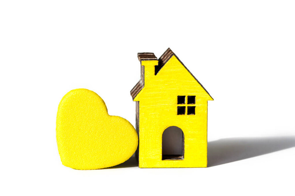 Yellow heart, yellow house isolated on white. Love home. Take me home concept. Adopt pets. Adoption concept - Photo, Image