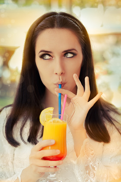 Young Woman with Colorful Cocktail Drink Outside - Valokuva, kuva