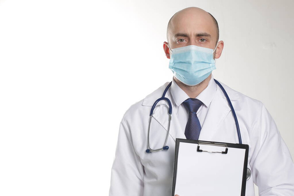 Stay home for us. Photo of family doctor examining patients virologist outbreak wear protective mask white lab coat blue neck tie isolated white color background - Fotografie, Obrázek