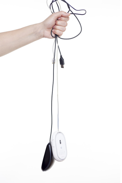 Computer mouse hanging in hand - Photo, Image