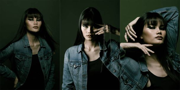 Moda mujer asiática tiene largo pelo negro liso usar chaqueta Jean y expresar sentimiento. Retrato de mujer asiática llevar muchos anillos sobre fondo de tono verde oscuro - Foto, Imagen