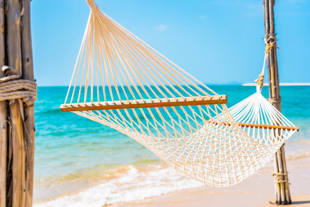 Empty white hammock around sea beach ocean for leisure travel vacation concept - Photo, Image