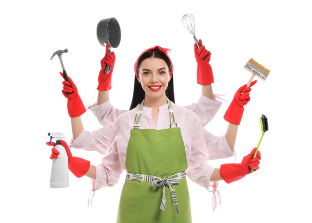 Многозадачная домохозяйка со многими руками держа разные вещи на белом фоне - Фото, изображение