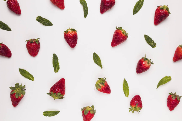 bright juicy strawberries green leaves white background. Resolution and high quality beautiful photo - Photo, Image