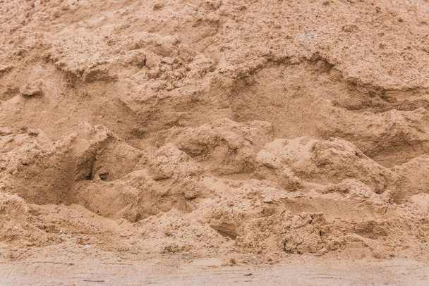 Haufen Sand Textur Hintergrund auf der Baustelle, Nahaufnahme. - Foto, Bild